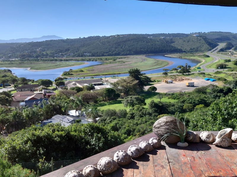 Elevated outdoor deck offering expansive panoramic views of the surrounding river, valley, and landscape.