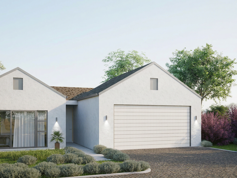 A modern single-story house exterior featuring a clean white facade, a large garage door, and a paved driveway surrounded by landscaped garden beds.
