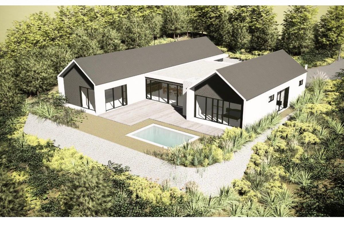 An aerial perspective of a modern residential property featuring a swimming pool, timber deck, and contemporary architectural design set within a landscaped environment.