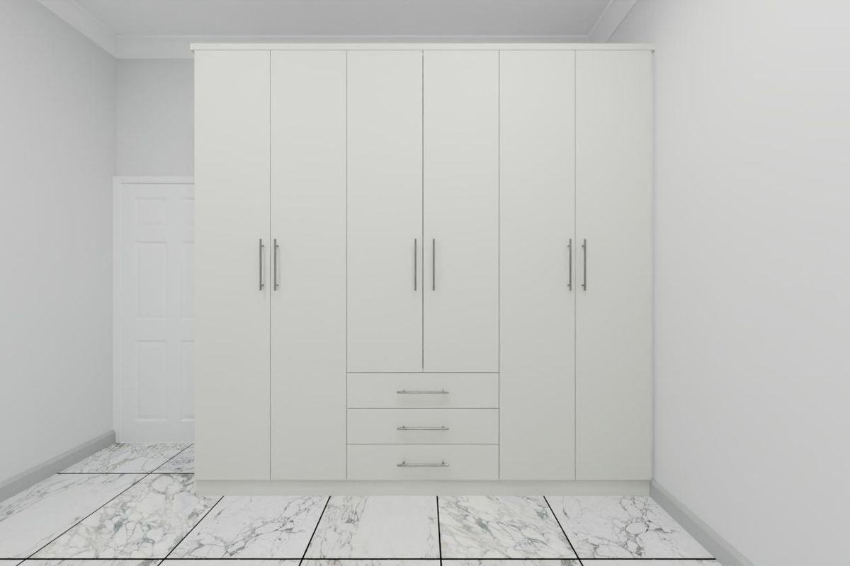 A clean, modern bedroom featuring a large white built-in wardrobe with integrated drawers and polished marble-look floor tiles.