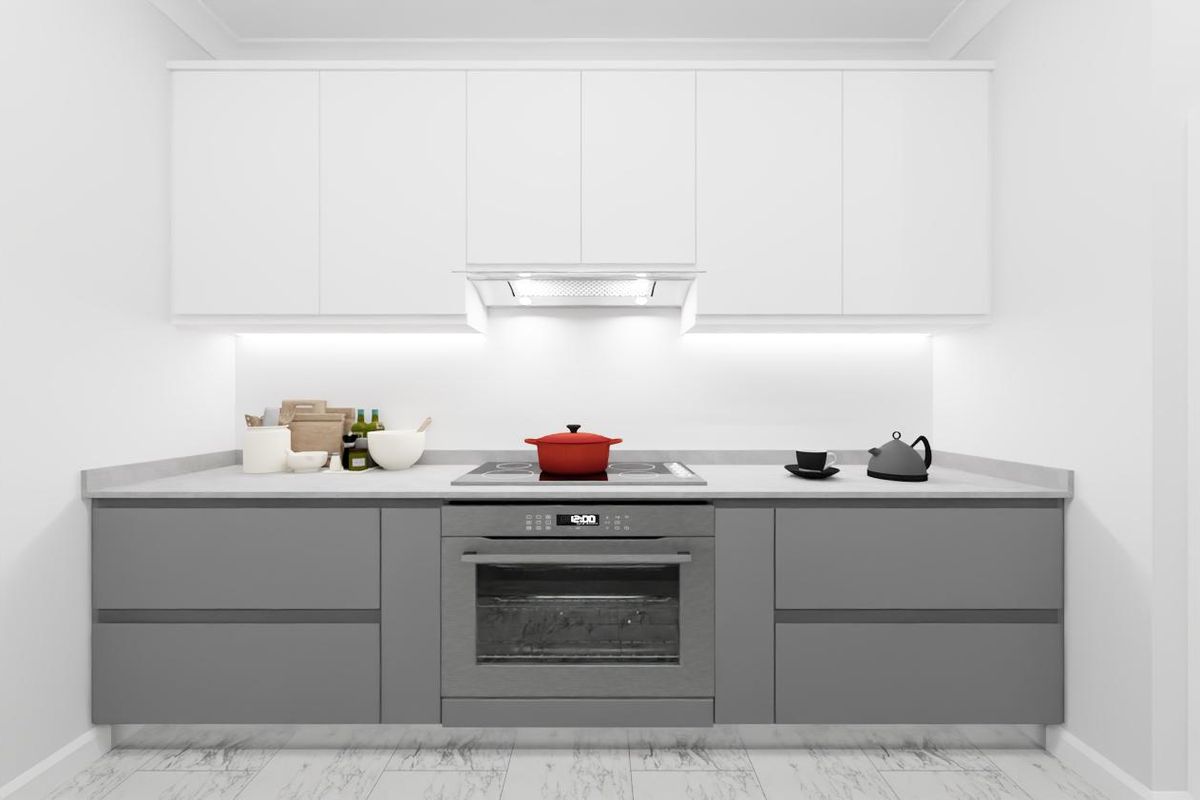 Modern kitchen featuring sleek grey handleless cabinetry, white upper cabinets, integrated oven, electric cooktop, and under-cabinet lighting with a clean marble-look floor.