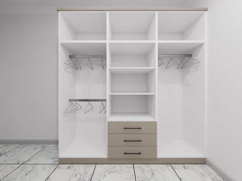 A modern bedroom featuring a clean, white built-in wardrobe with integrated shelving, hanging rails, and drawers, complemented by marble-look floor tiles.