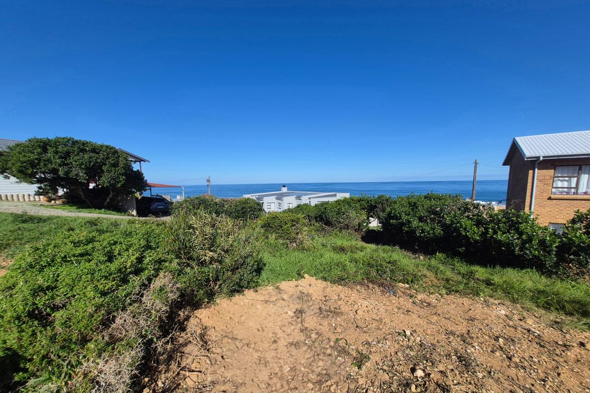 A scenic view of the ocean from the vacant residential land, showcasing the coastal landscape and surrounding neighborhood.