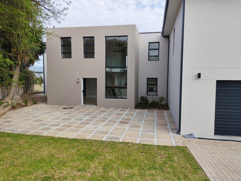 Exclusive Coastal Living with Panoramic Ocean Views Welcome to this beautifully renovated, contempor - Photo 3