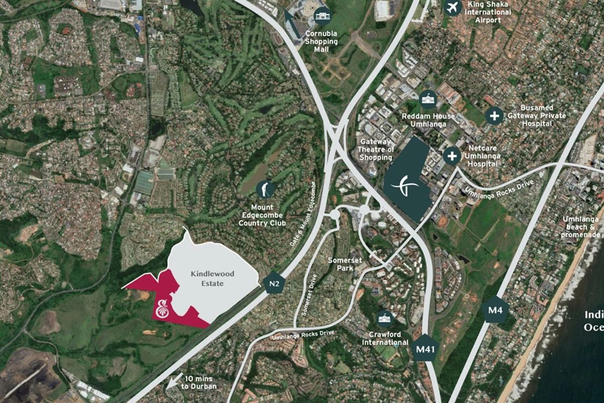 An aerial map view showing the location of Kindlewood Estate in relation to local amenities, major roads, and the coastline.