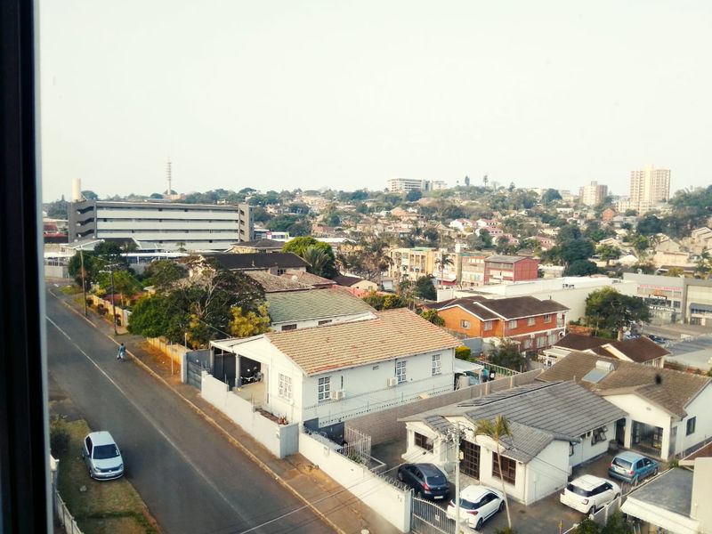 An elevated view overlooking the surrounding residential neighborhood and streetscape.