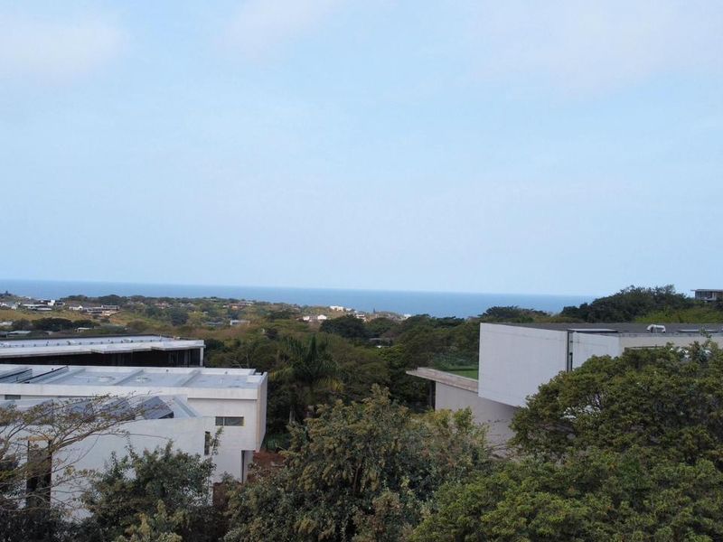 An elevated view overlooking the surrounding coastal landscape and ocean horizon.