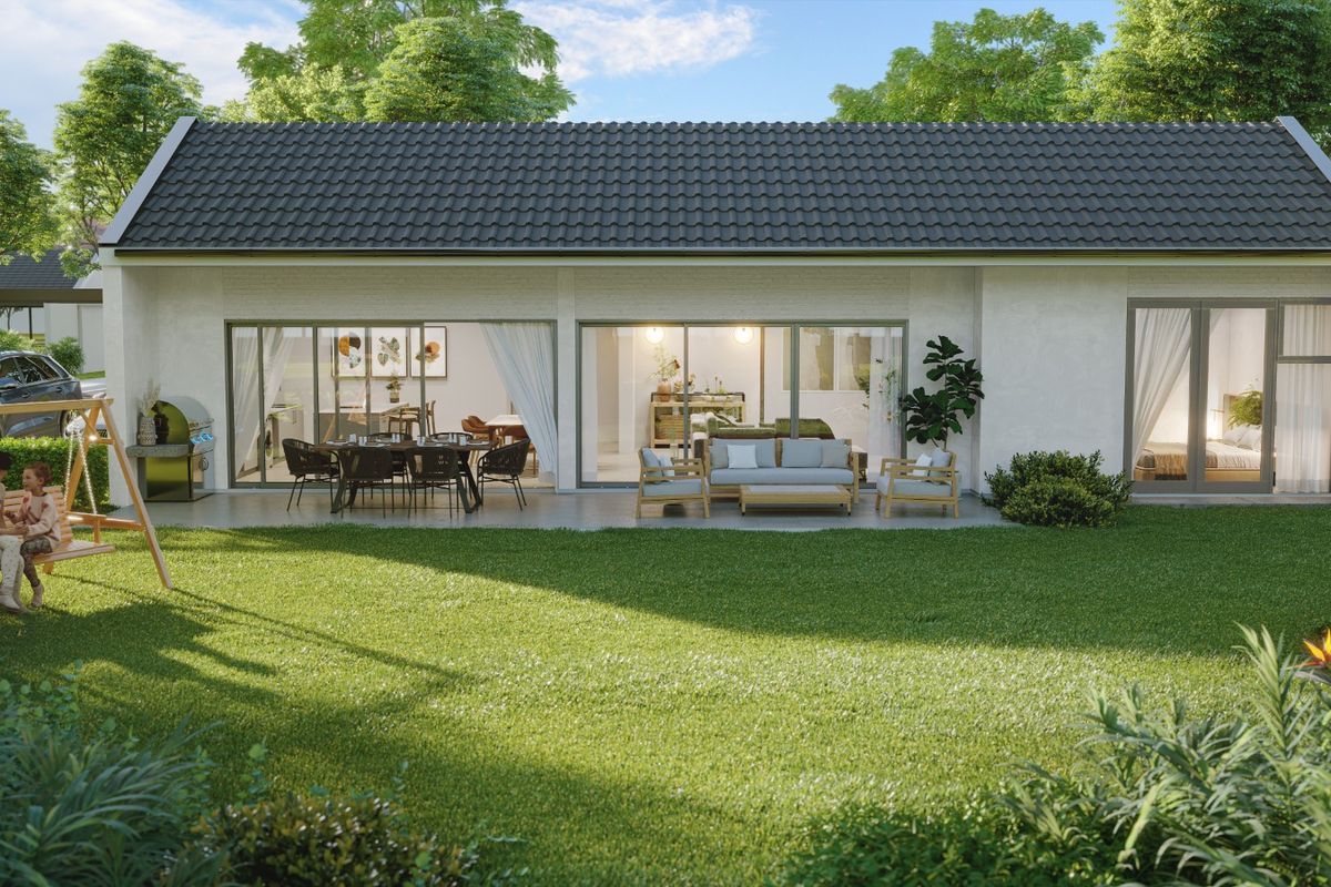 A rear view of a modern residential property featuring a spacious patio, large sliding glass doors, and a well-maintained garden.