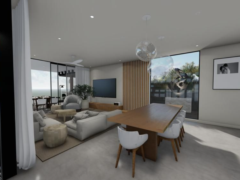 Spacious open-plan living and dining area featuring polished concrete floors, a timber slat feature wall, and expansive floor-to-ceiling glass doors opening to the outdoors.
