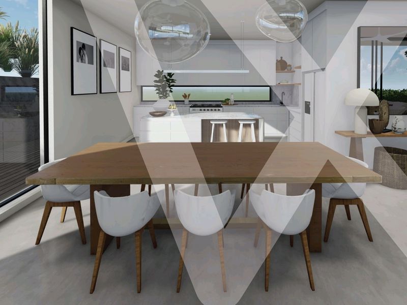 Modern open-plan living and dining area featuring a sleek kitchen with island, integrated appliances, and large sliding doors opening to an outdoor deck.
