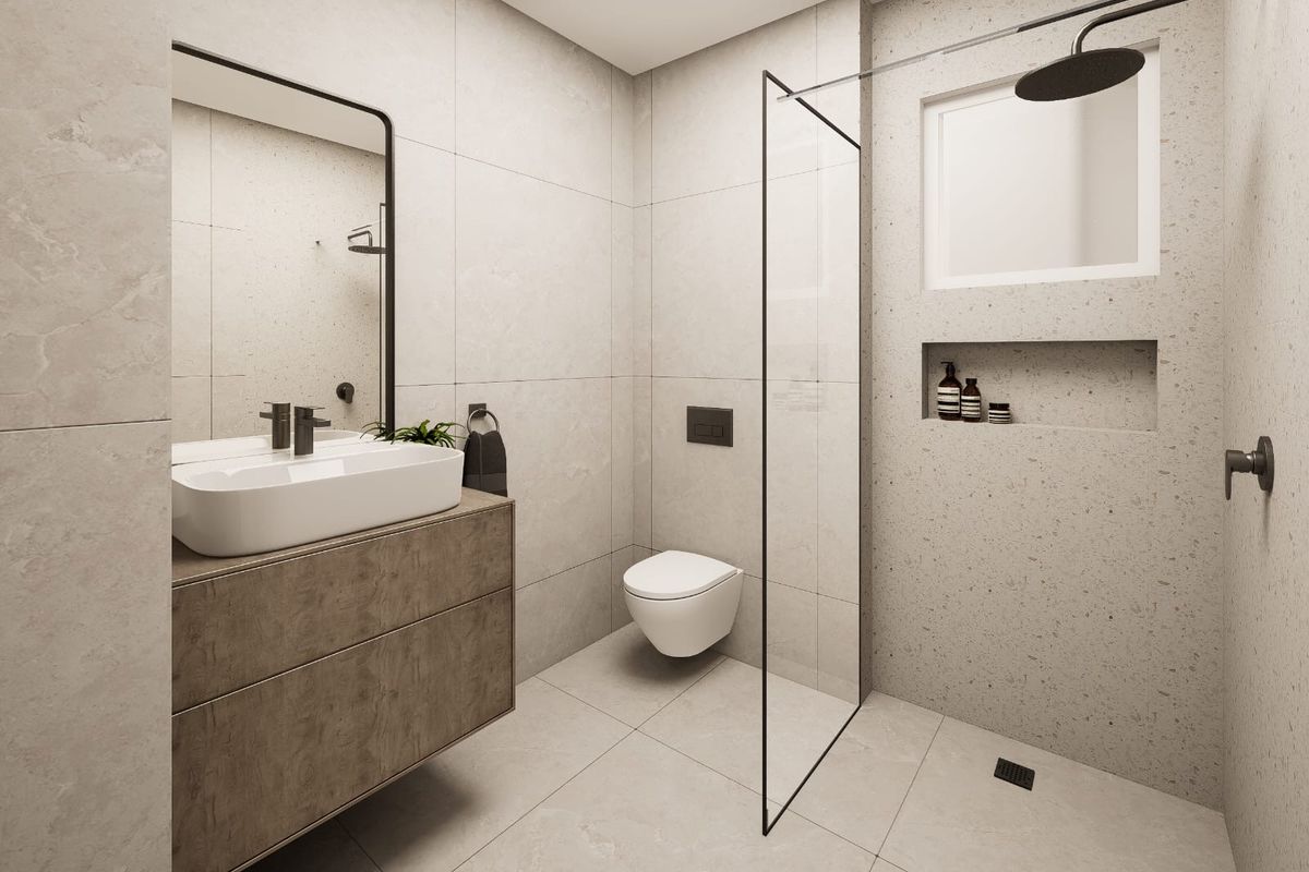 Modern bathroom featuring a wall-mounted vanity, vessel sink, walk-in shower with glass screen, and high-end neutral tiling throughout.