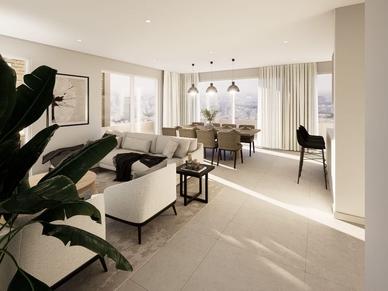 A bright and modern open-plan living and dining area featuring large windows, tiled flooring, and contemporary pendant lighting with an expansive city view.