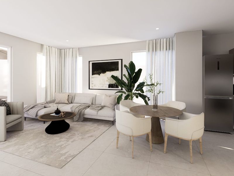 A bright and modern open-plan living and dining area featuring neutral tones, tiled flooring, recessed lighting, and seamless access to an outdoor patio.