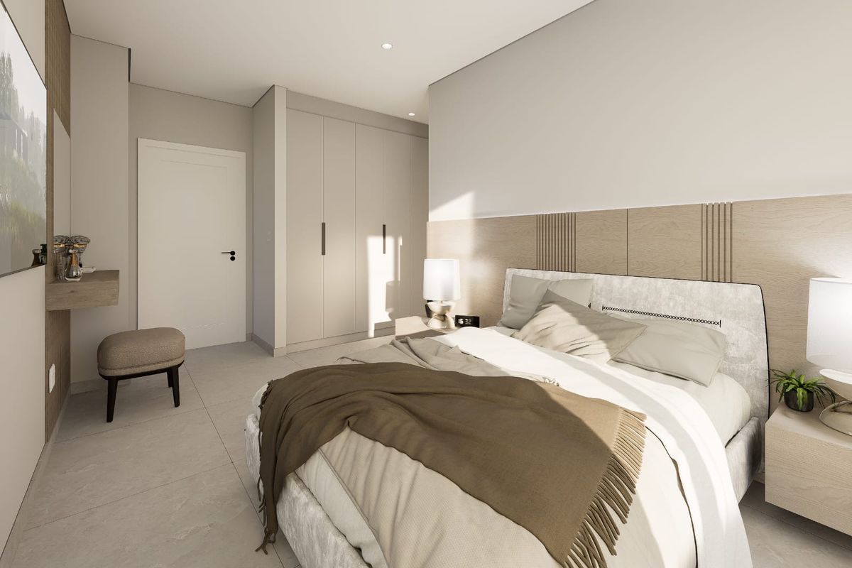 Modern bedroom featuring a built-in wardrobe, wood panel headboard, and neutral tiled flooring with recessed lighting.