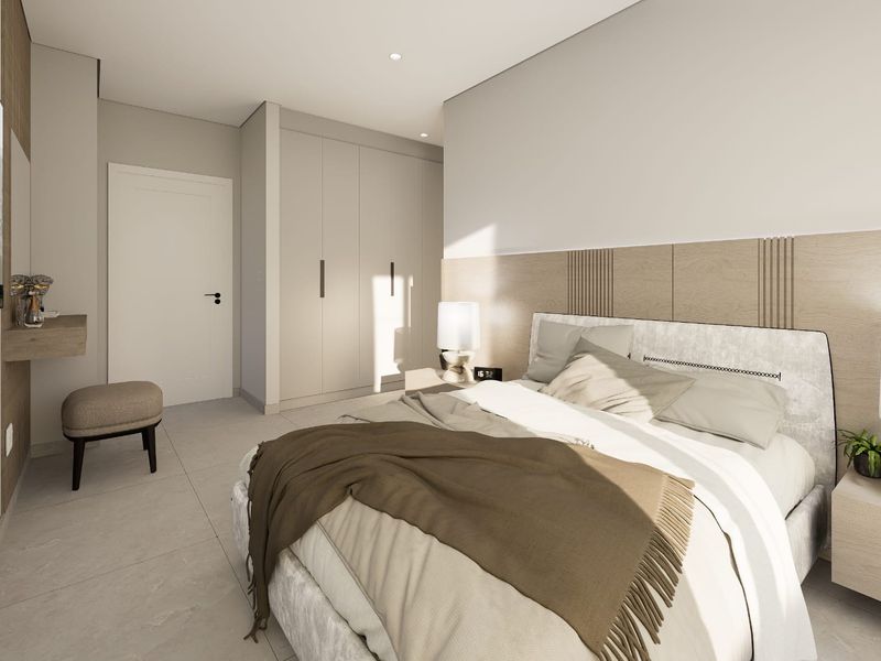 Modern bedroom featuring a built-in wardrobe, wood panel headboard, and neutral tiled flooring with recessed lighting.