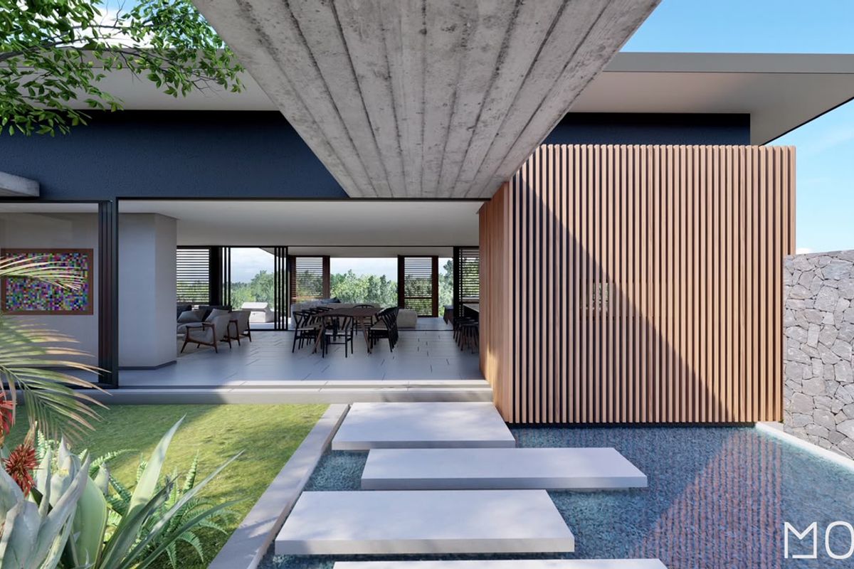 Modern architectural rear elevation featuring a concrete overhang, timber slat detailing, stone wall, and a tranquil water feature with stepping stones.