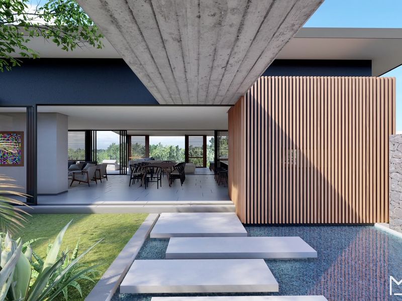 Modern architectural rear elevation featuring a concrete overhang, timber slat detailing, stone wall, and a tranquil water feature with stepping stones.