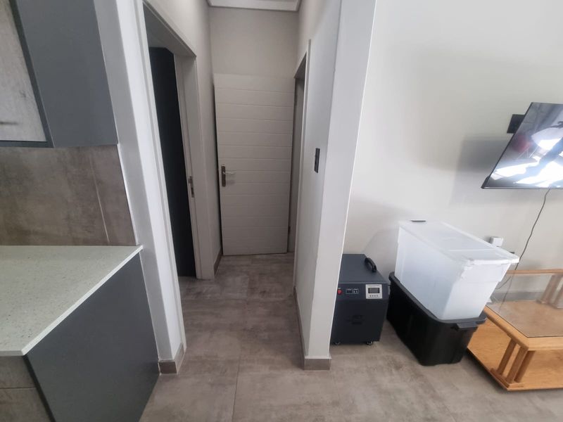 Ultra-modern, pet-friendly, ground floor apartment in Rynfield - Photo 10