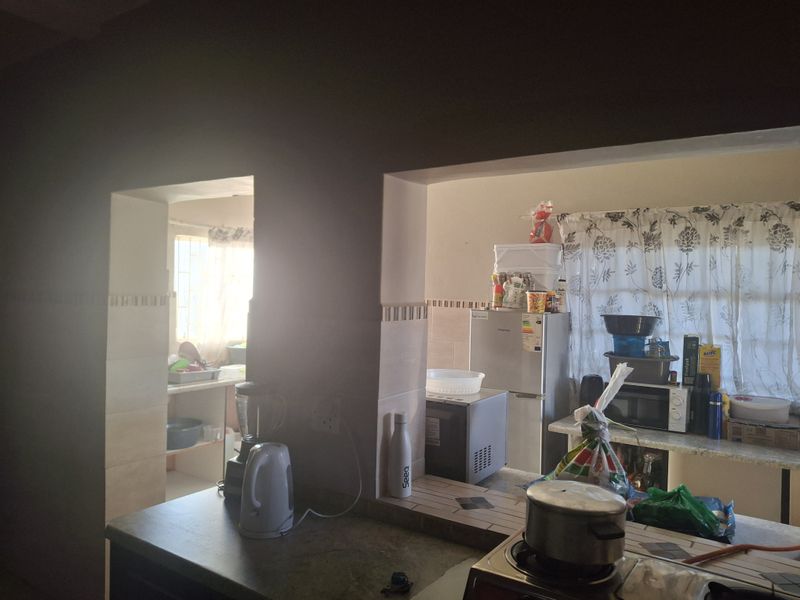 Spacious 4-Bedroom Home with Income Potential & Modern Comforts - Photo 10