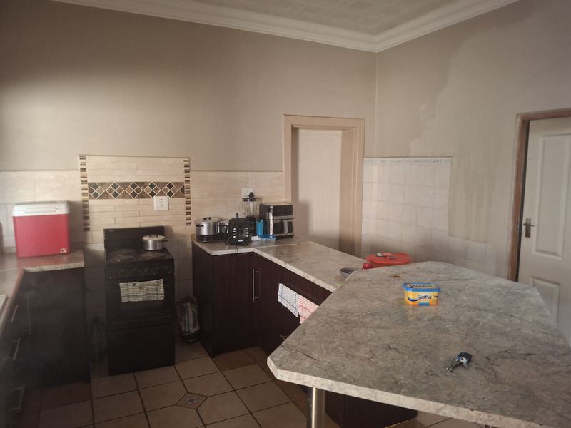 Spacious 4-Bedroom Home with Income Potential & Modern Comforts - Photo 7