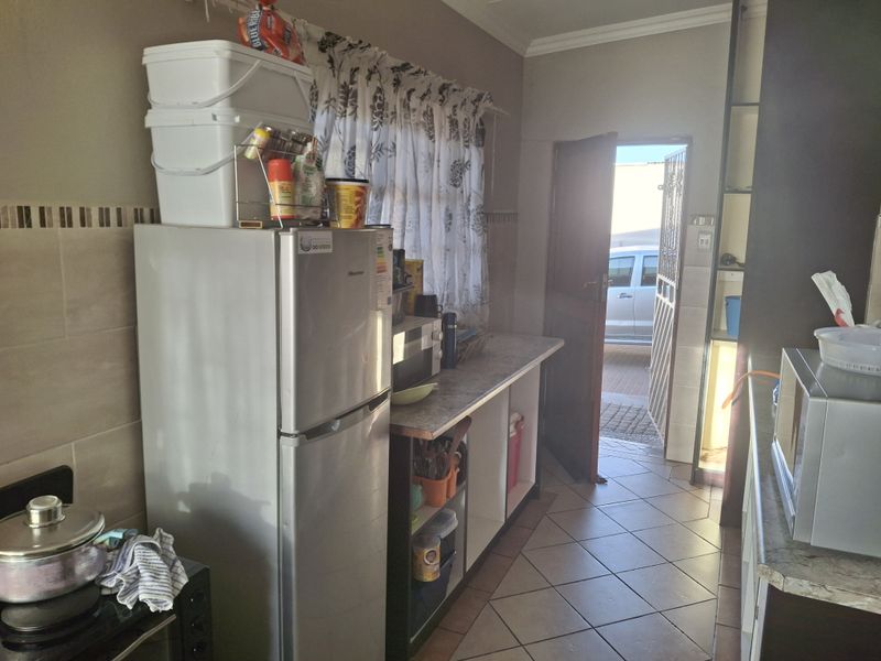 Spacious 4-Bedroom Home with Income Potential & Modern Comforts - Photo 6