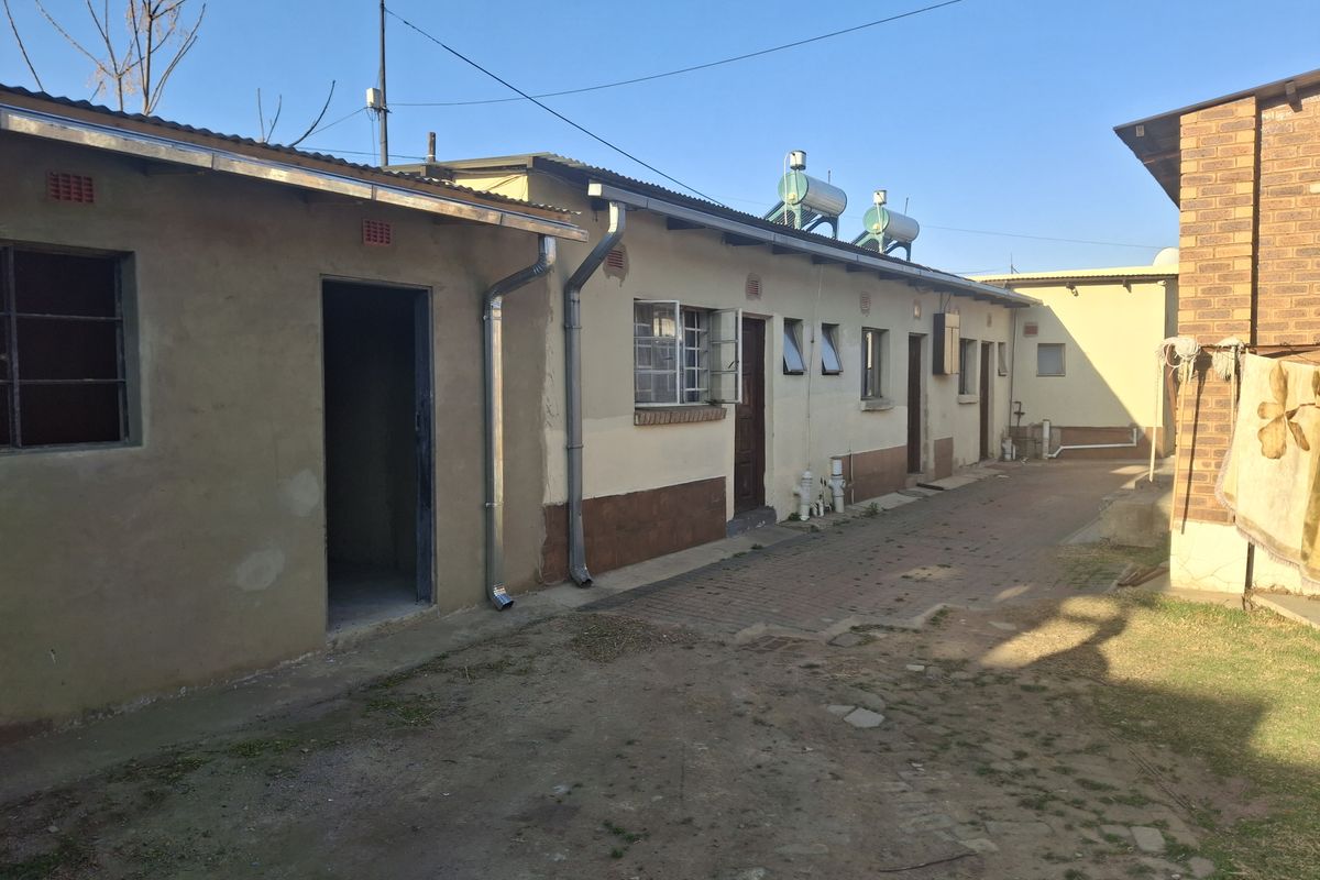 Spacious 4-Bedroom Home with Income Potential & Modern Comforts - Photo 2