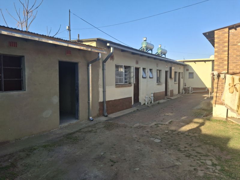 Spacious 4-Bedroom Home with Income Potential & Modern Comforts - Photo 2