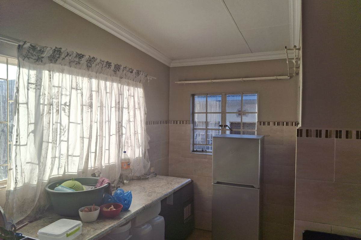 Spacious 4-Bedroom Home with Income Potential & Modern Comforts - Photo 5