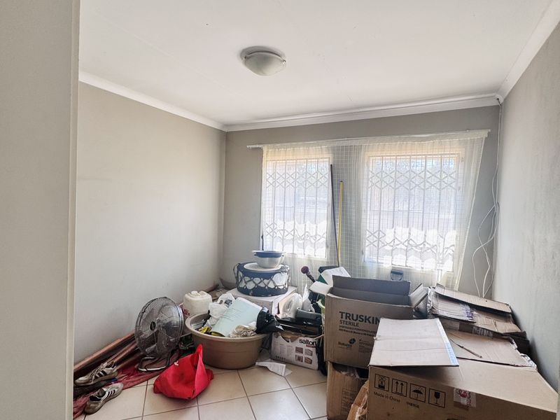 Sole Mandate! Spacious 3-Bedroom Home with Big Yard, Carport and Safe Location - Photo 9