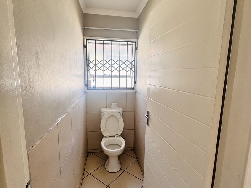 Sole Mandate! Spacious 3-Bedroom Home with Big Yard, Carport and Safe Location - Photo 6