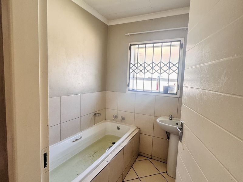 Sole Mandate! Spacious 3-Bedroom Home with Big Yard, Carport and Safe Location - Photo 7