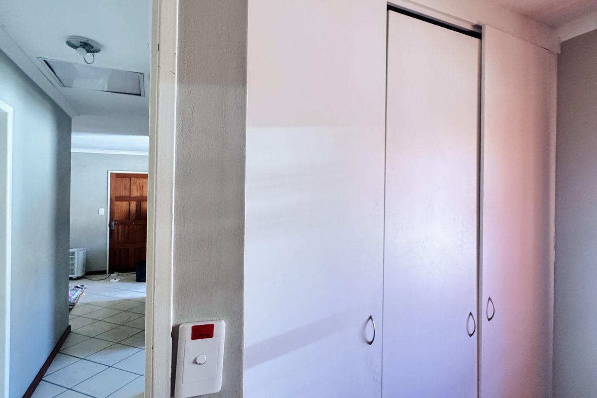 Sole Mandate! Spacious 3-Bedroom Home with Big Yard, Carport and Safe Location - Photo 4