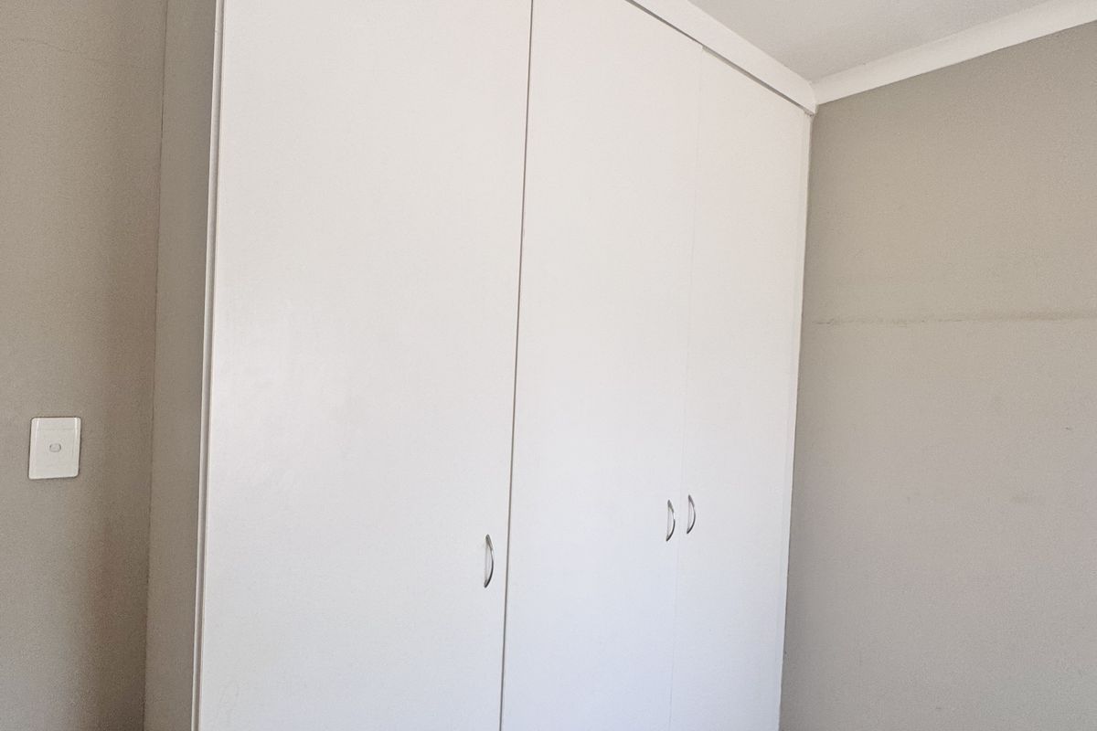 Sole Mandate! Spacious 3-Bedroom Home with Big Yard, Carport and Safe Location - Photo 5