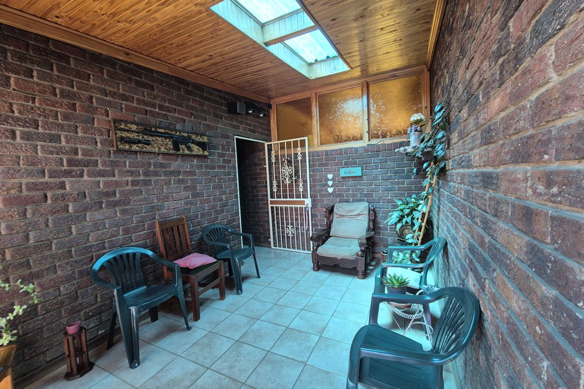 Move-In Ready Family Gem Near Carnival Mall with Ample Space & Style - Photo 4
