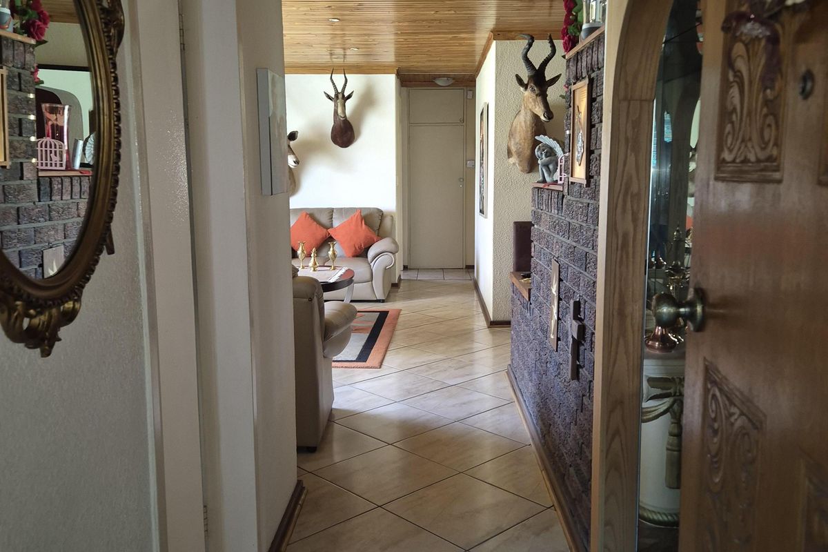 Move-In Ready Family Gem Near Carnival Mall with Ample Space & Style - Photo 5