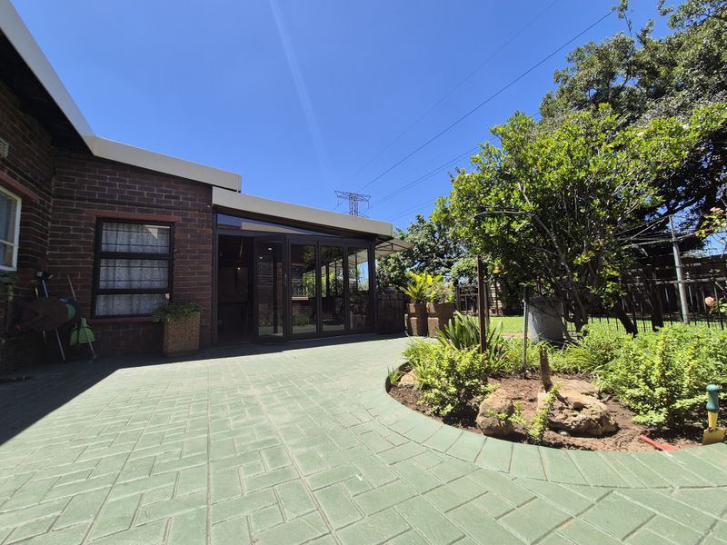 Move-In Ready Family Gem Near Carnival Mall with Ample Space & Style - Photo 1