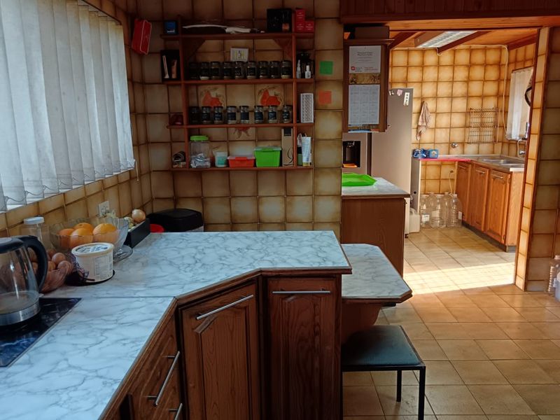 Spacious 4-Bedroom Home in Security in Boomed Area - Photo 9