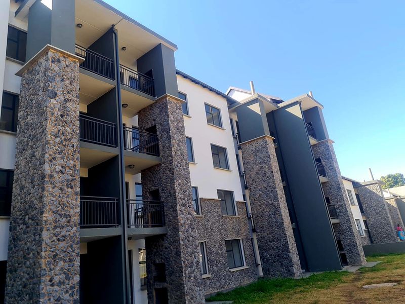 Lock-Up-and-Go Living with Built-In Braai – 2-Bedroom Townhouse - Photo 1