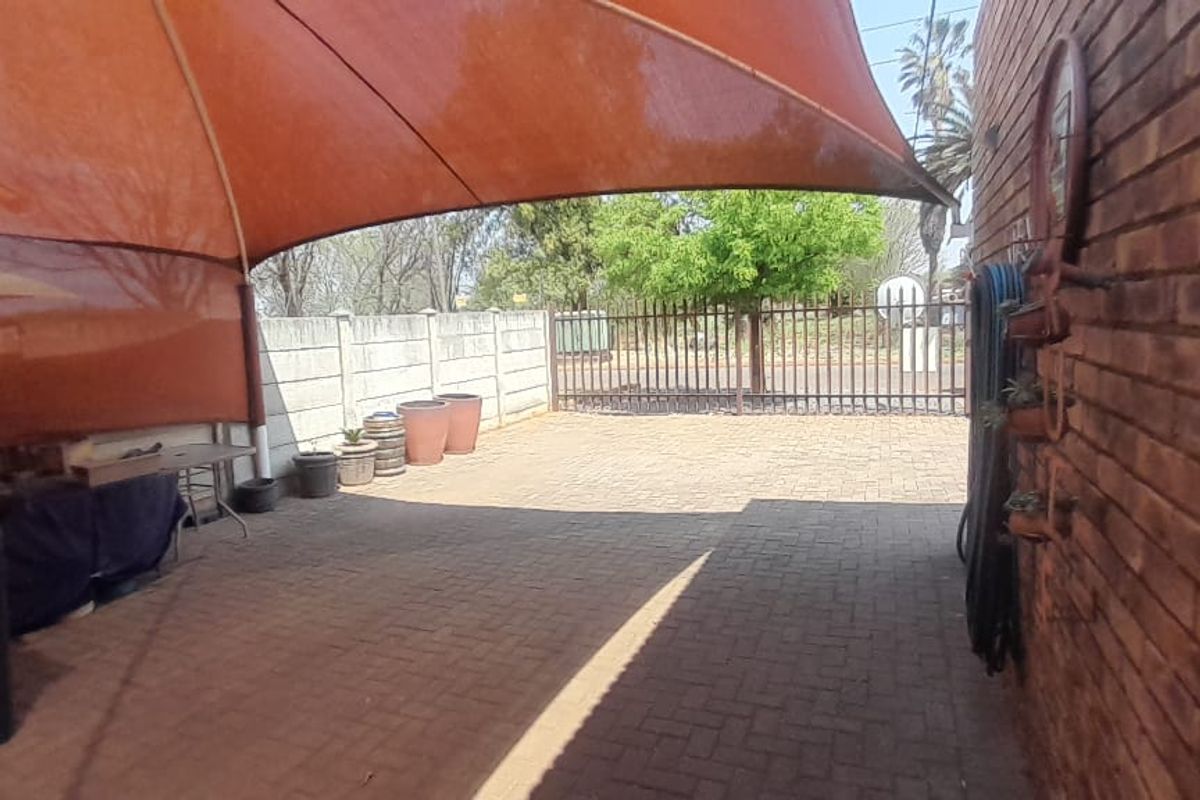 This stunning face-brick family home is the perfect haven for you! - Photo 5