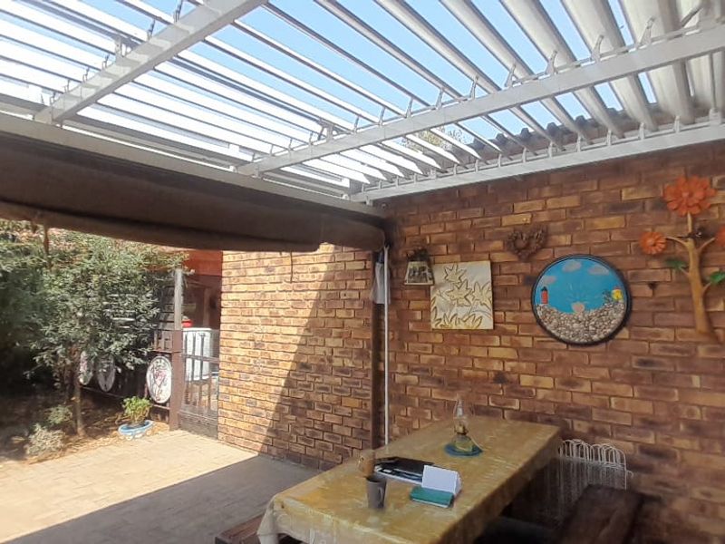 This stunning face-brick family home is the perfect haven for you! - Photo 7