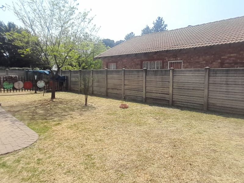 This stunning face-brick family home is the perfect haven for you! - Photo 6