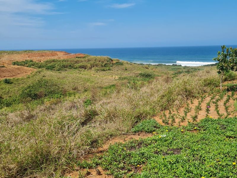 A scenic view of the coastal landscape and ocean from the vacant residential land.