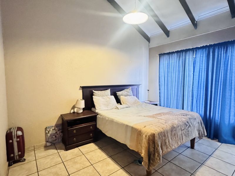 Live In, Rent Out, or Both | This Subdivided Property Offers 2 Flats, Garage, Carport, Extra Parking - Photo 7