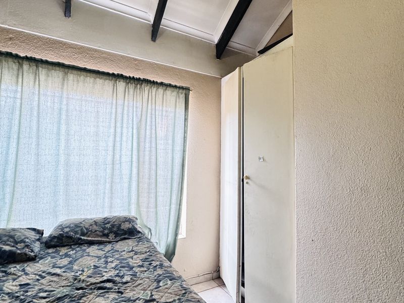 Live In, Rent Out, or Both | This Subdivided Property Offers 2 Flats, Garage, Carport, Extra Parking - Photo 9