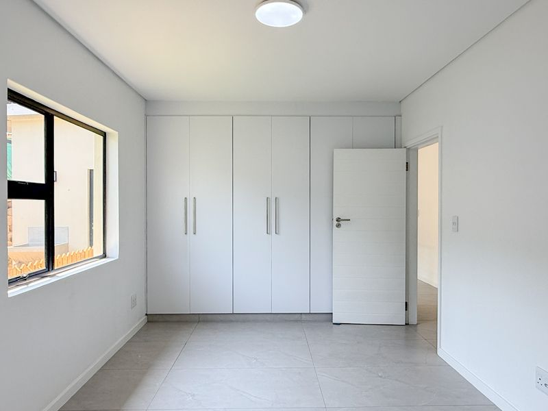 Modern Coastal Living in the Heart of La Mercy - Photo 10