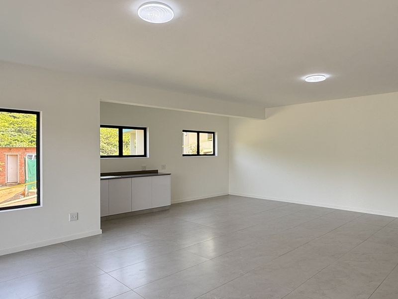 Modern Coastal Living in the Heart of La Mercy - Photo 4