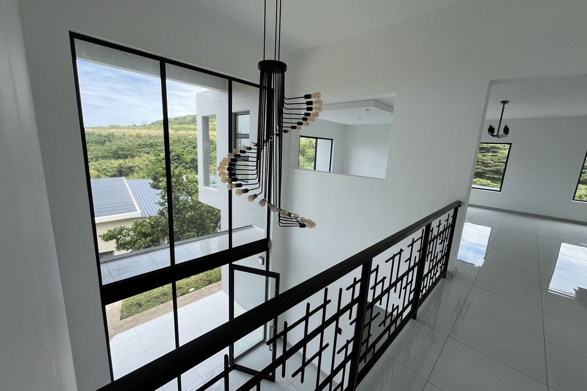 Modern Coastal Living in the Heart of La Mercy - Photo 2