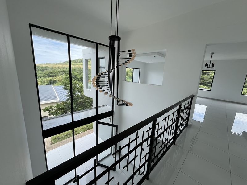 Modern Coastal Living in the Heart of La Mercy - Photo 2