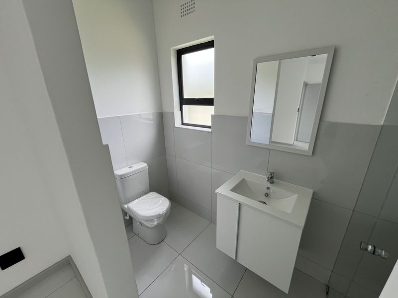 Modern Coastal Living in the Heart of La Mercy - Photo 10