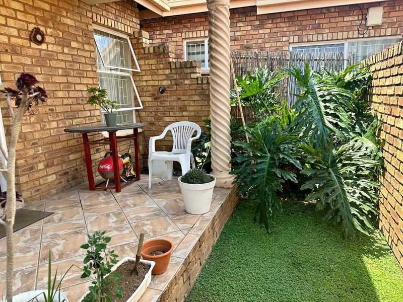 Your Perfect Starter Home Awaits — Garden, Garage & More! - Photo 3